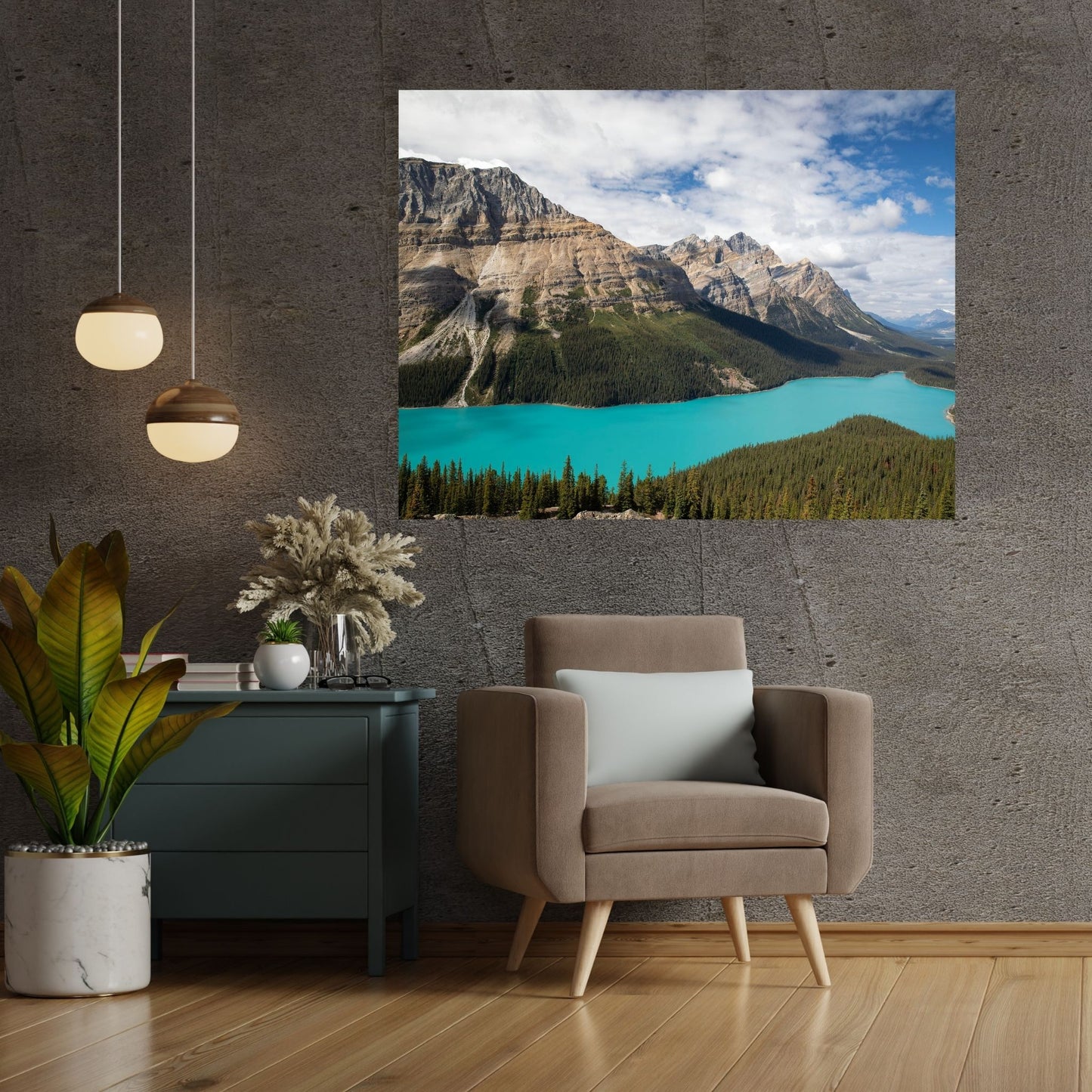 A modern, earthy living room setting featuring a large fine art photograph of Peyto Lake, Banff National Park, Canada. The vibrant turquoise lake contrasts beautifully with the rustic brown walls, creating a striking centerpiece. The cozy armchair and natural decor elements add a calming atmosphere, complementing the stunning landscape photography above.