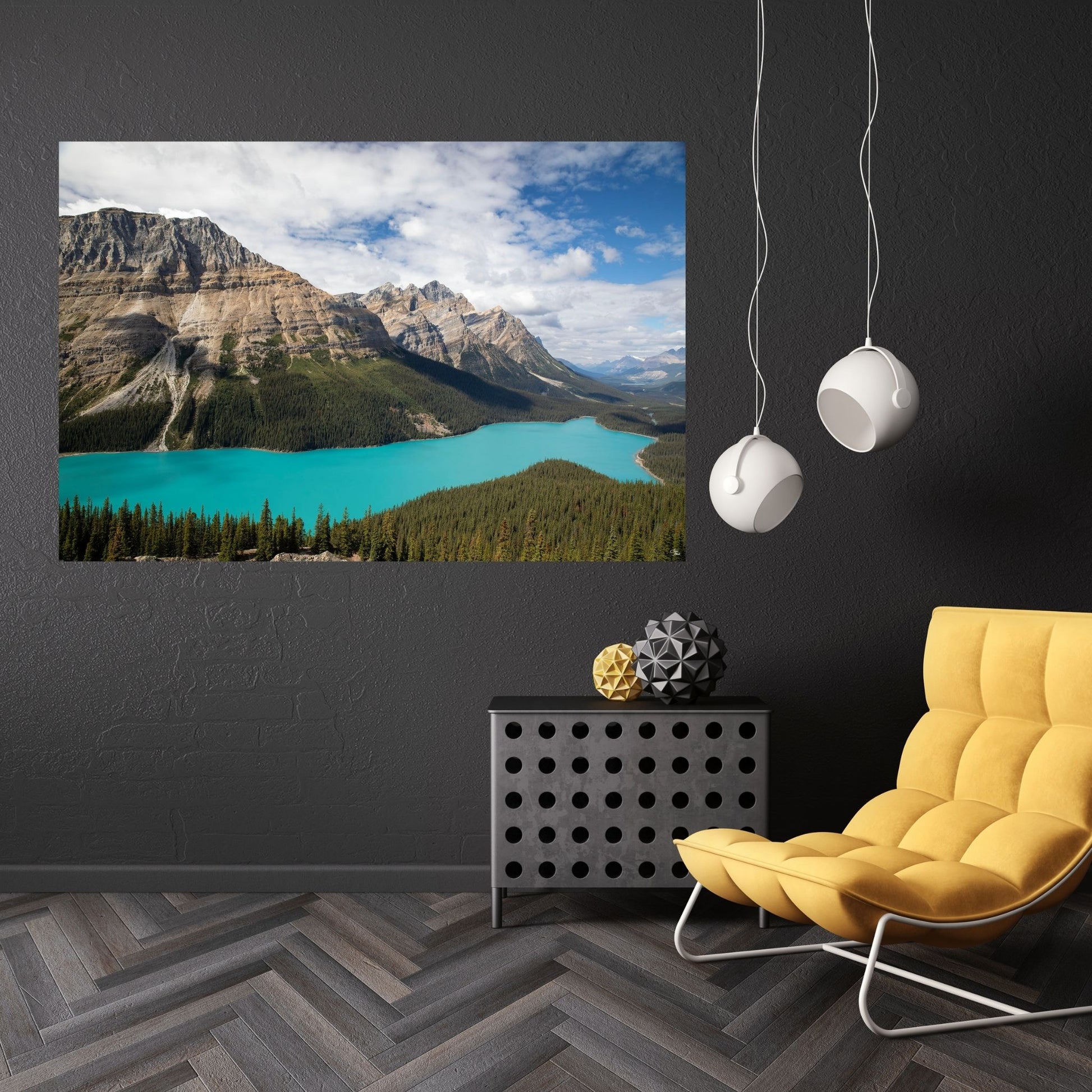 A modern dark grey room featuring a bold yellow chair, complemented by a large fine art photograph of Peyto Lake, Banff National Park. The vibrant turquoise waters of the lake contrast beautifully against the dark grey wall, while the geometric decor adds a contemporary touch. This striking piece of art brings nature’s tranquility into a stylish, modern space, creating a perfect balance between bold design and serene landscape.